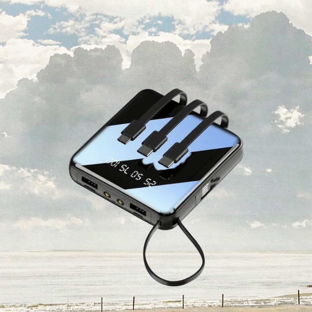 Mini power bank with built-in cables and LED display on a white background