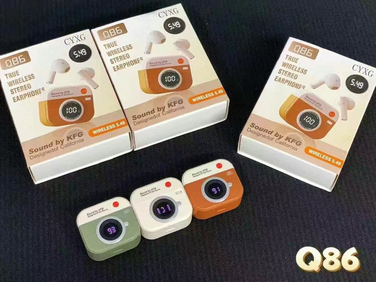 Q86 charging cases in green, cream and orange alongside retail boxes