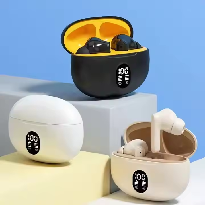Wireless earbuds charging cases in black, white and beige with LED battery indicators